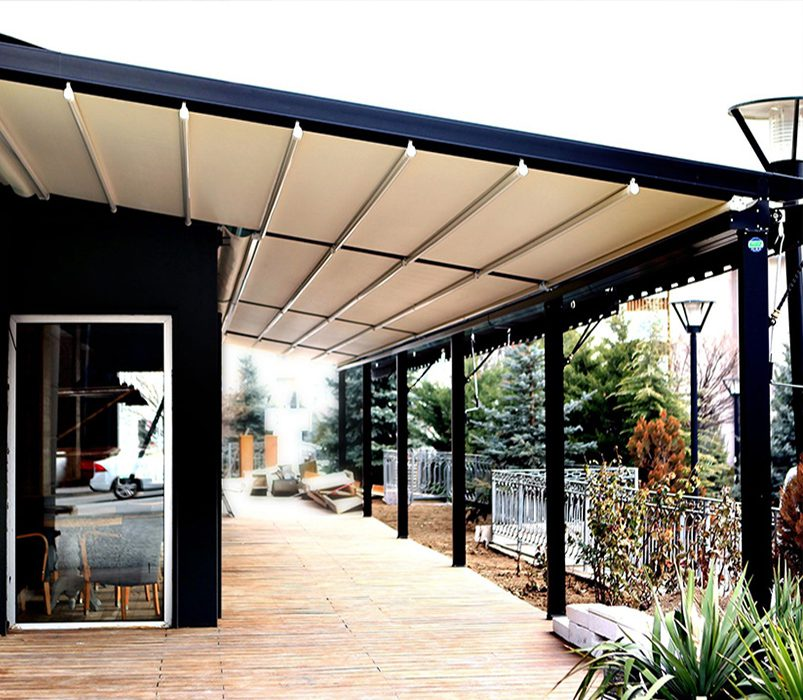 Restaurant patio with retractable roof and glass enclosure