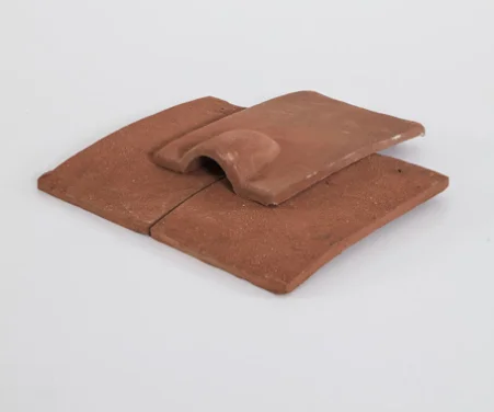 Ornamental handmade clay roof tile
